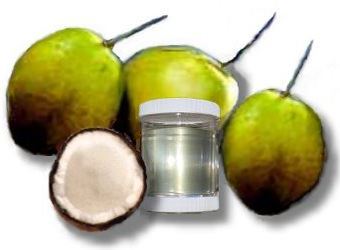 Picture of coconuts with a bottle of Virgin Coconut Oil